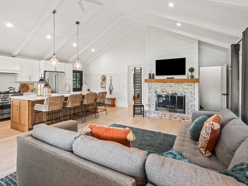 6 Winding Cove Road Ashburnham, MA 01430 - Photo 9 of 40 a living room with furniture flat screen tv and a fireplace