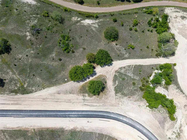a view of a lake beach and a mountain