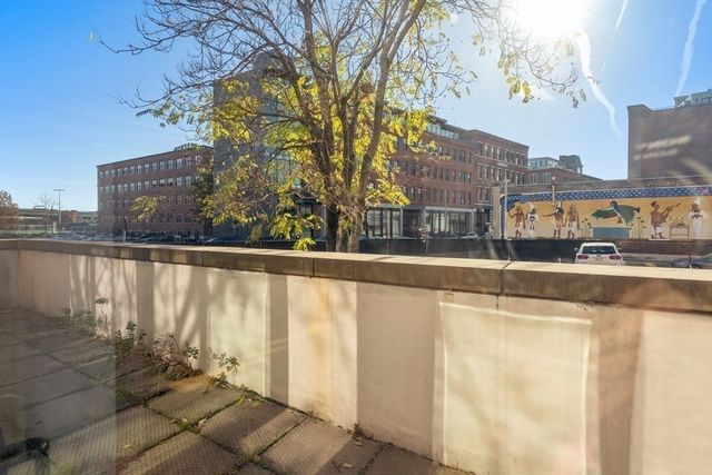 a view of a lake from a balcony