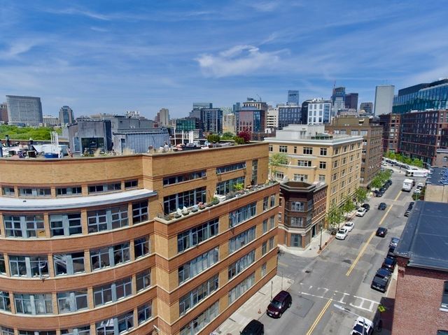 a view of a city with tall buildings