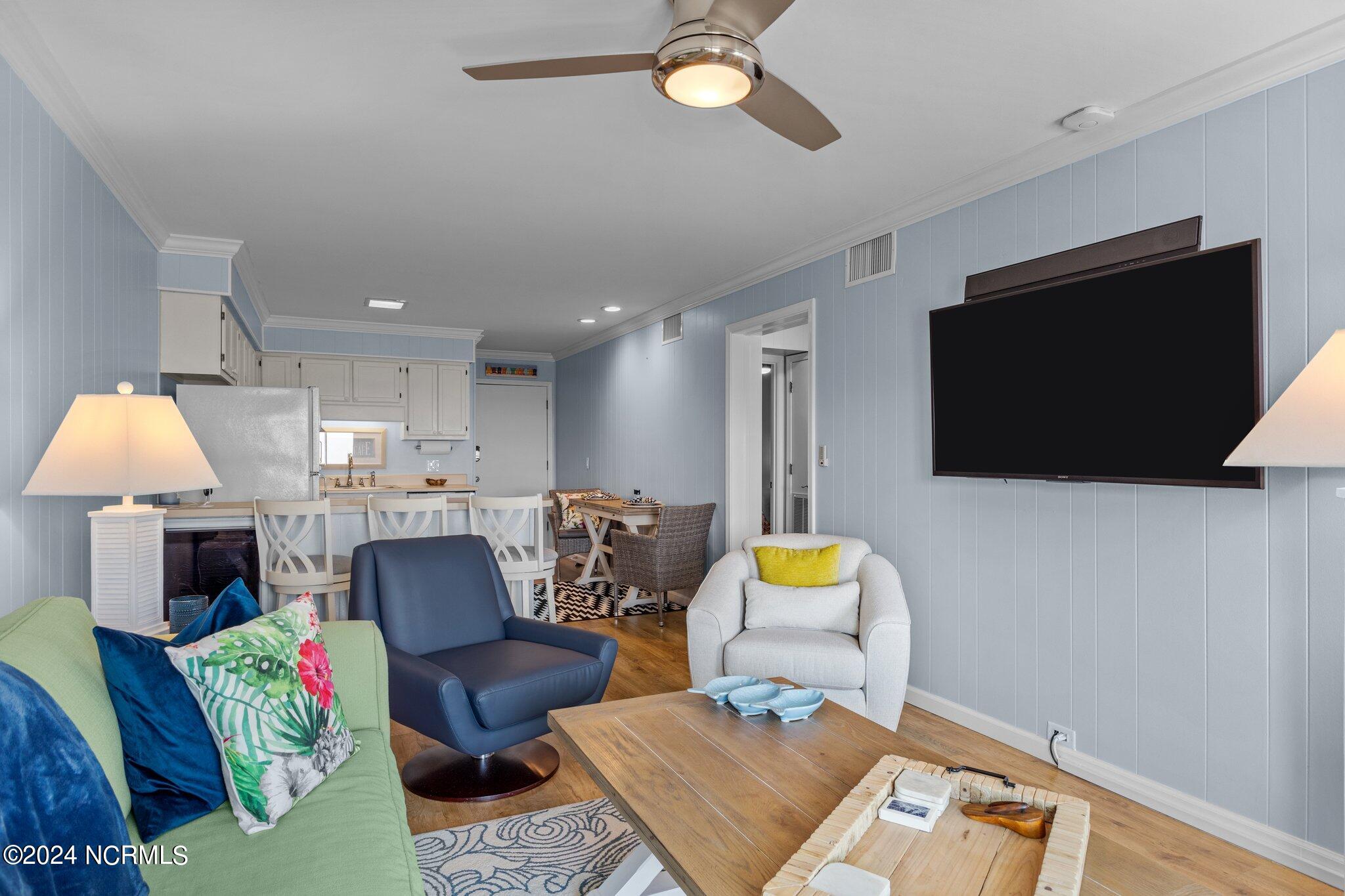 301 Commerce Way, Unit 349 Atlantic Beach, NC 28512 - Photo 11 of 38 Living Area Into Kitchen