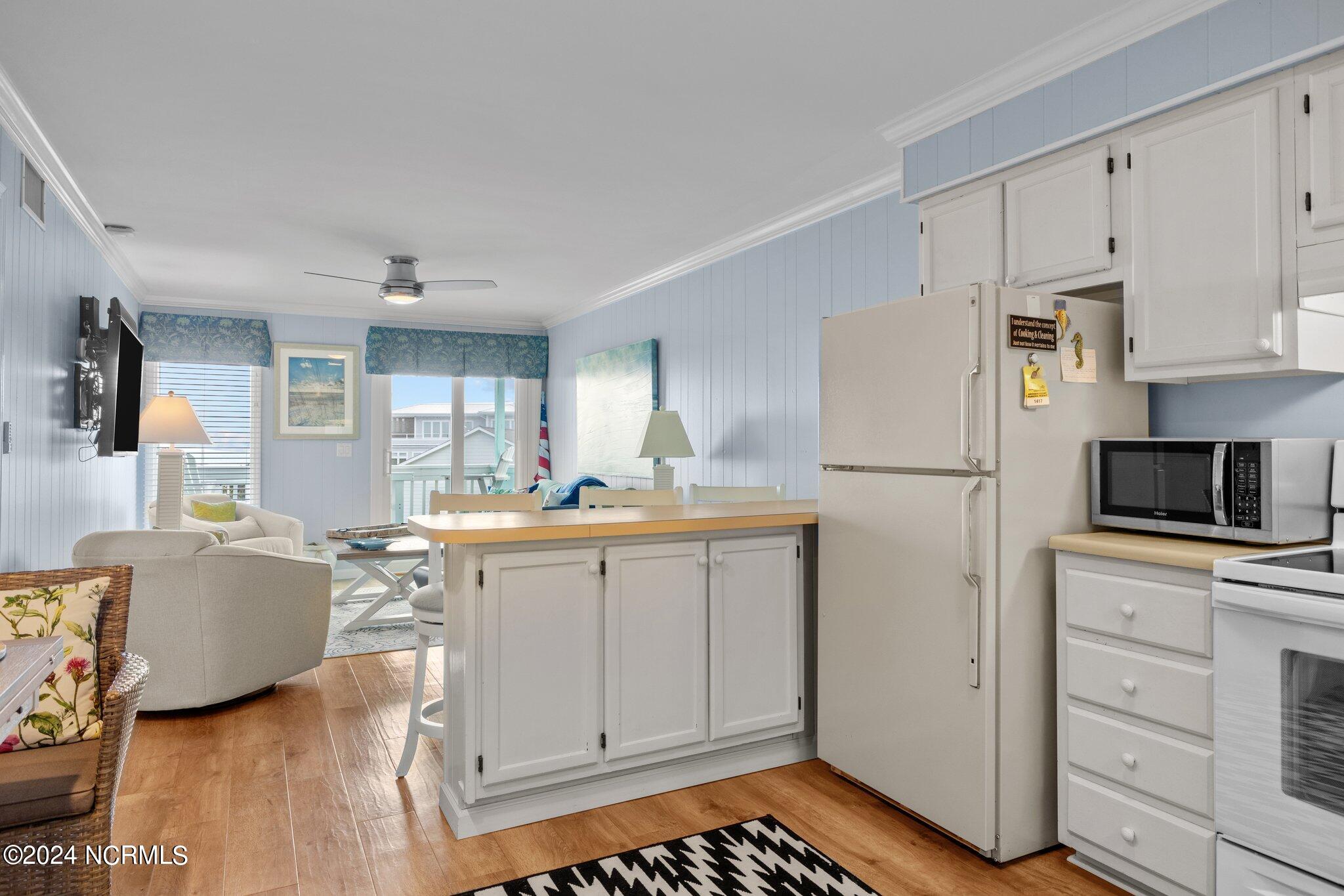 301 Commerce Way, Unit 349 Atlantic Beach, NC 28512 - Photo 3 of 38 Open Concept Kitchen & Living Area