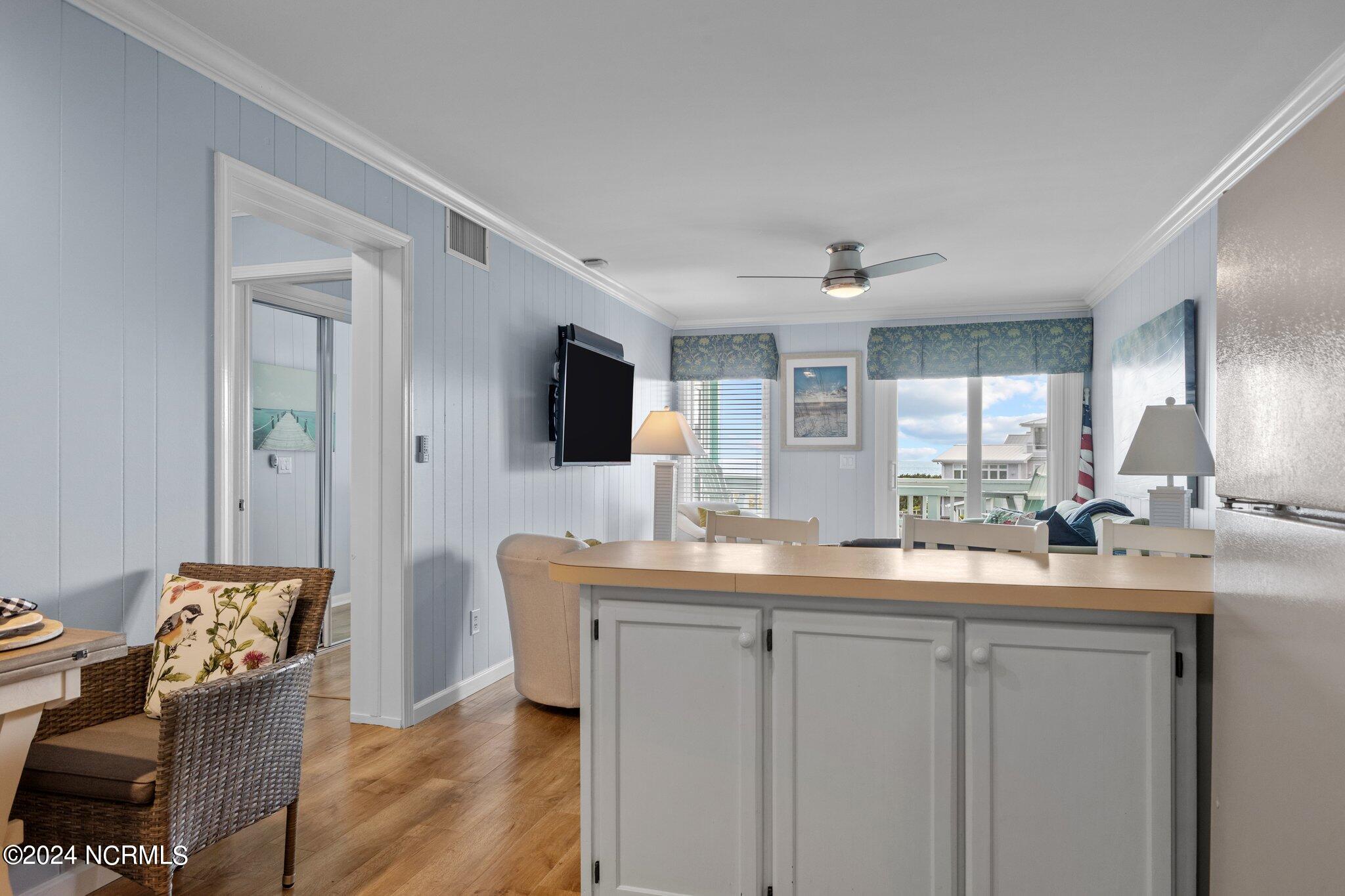 301 Commerce Way, Unit 349 Atlantic Beach, NC 28512 - Photo 7 of 38 Kitchen Into Living Area