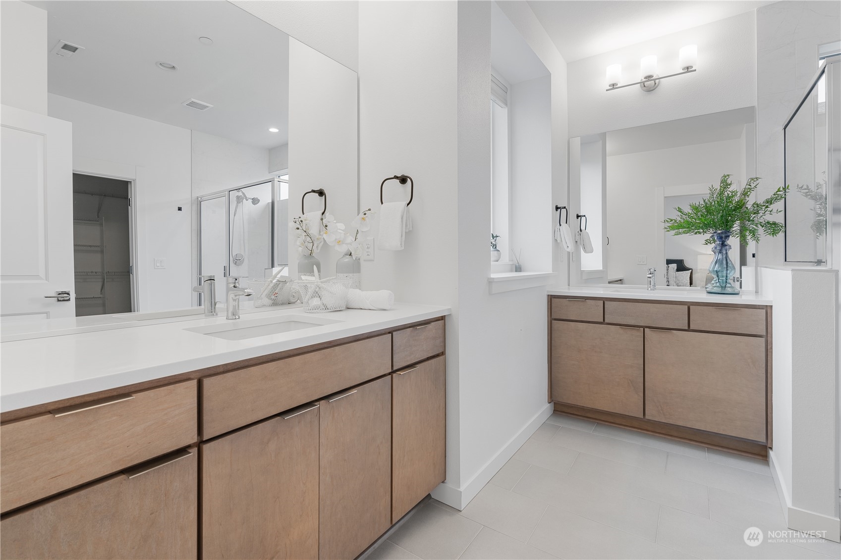 21722 24th Avenue Southeast, Unit A Bothell, WA 98021 - Photo 20 of 38 a bathroom with a sink and a mirror