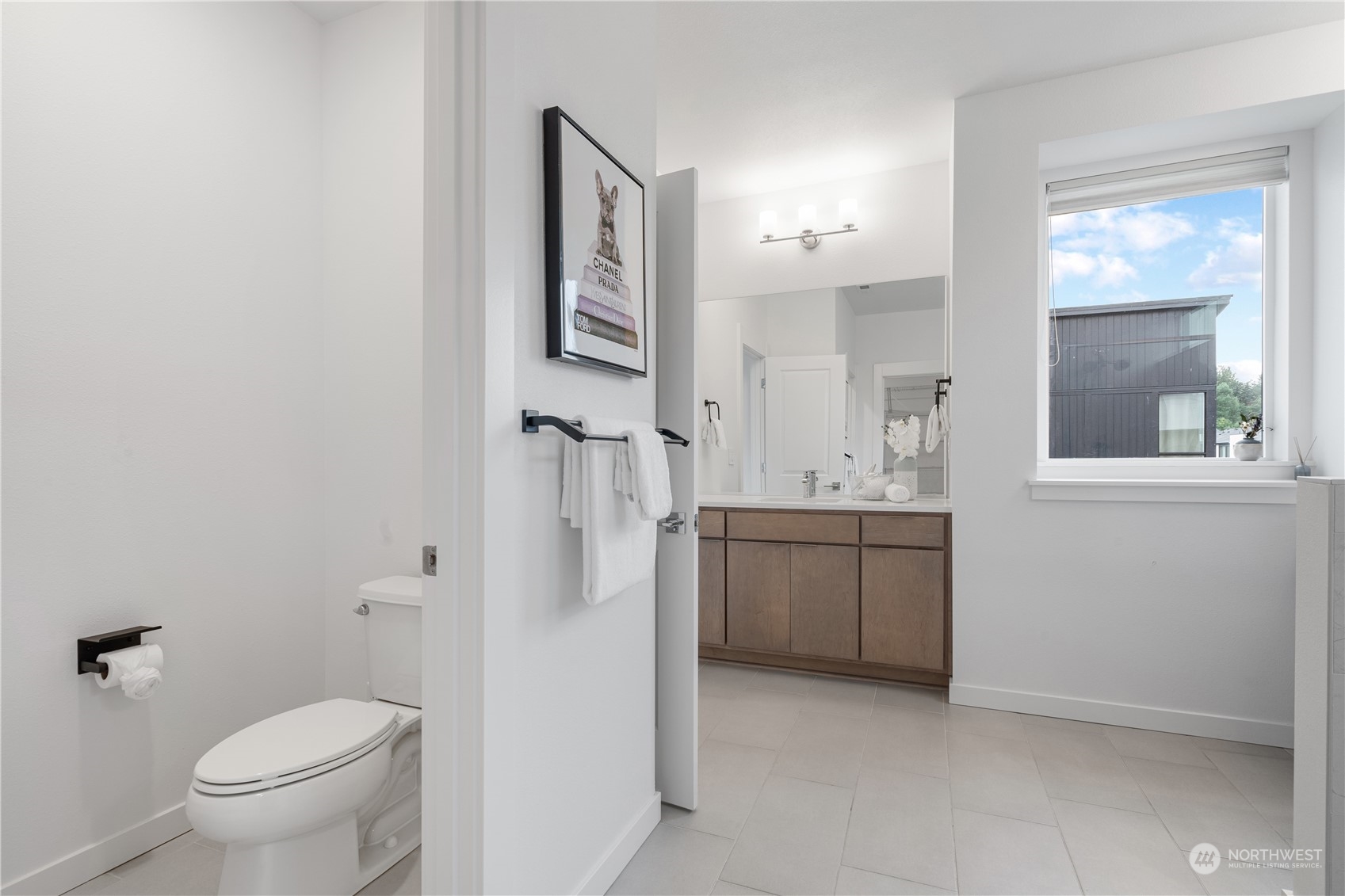 21722 24th Avenue Southeast, Unit A Bothell, WA 98021 - Photo 24 of 38 a bathroom with a granite countertop sink toilet and shower