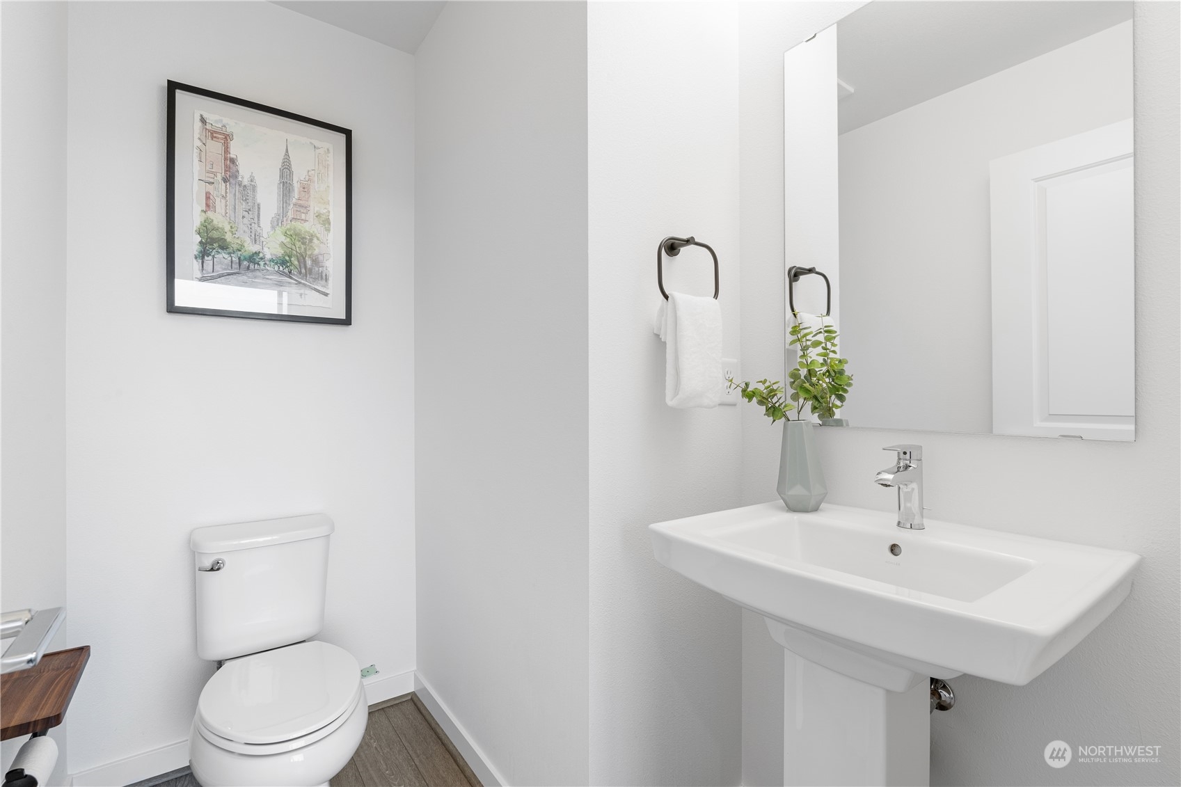 21722 24th Avenue Southeast, Unit A Bothell, WA 98021 - Photo 31 of 38 a bathroom with a toilet sink and mirror