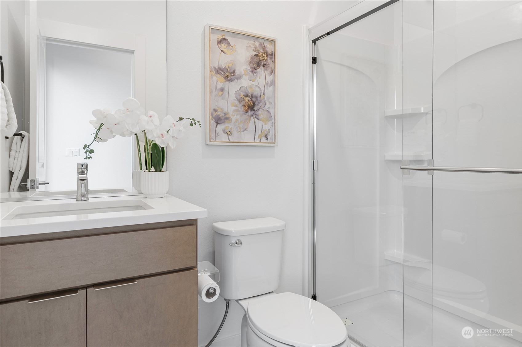 21722 24th Avenue Southeast, Unit A Bothell, WA 98021 - Photo 33 of 38 a bathroom with a toilet sink and shower