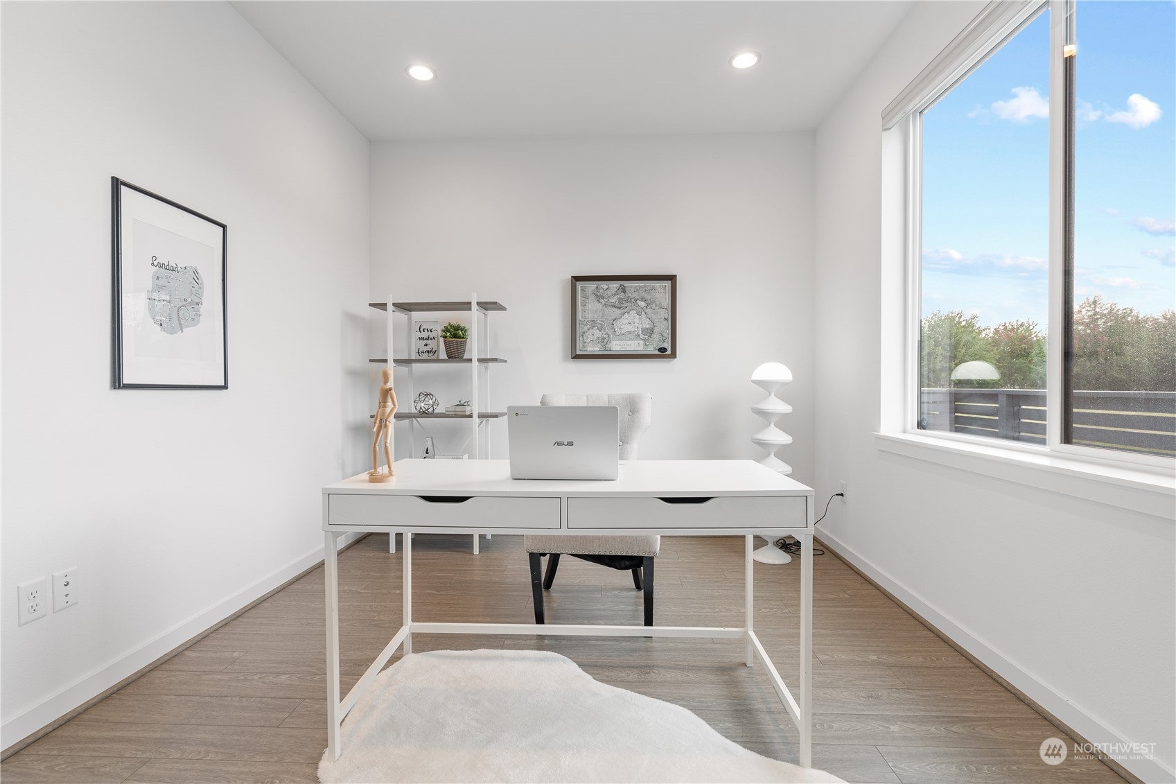 21722 24th Avenue Southeast, Unit A Bothell, WA 98021 - Photo 34 of 38 a workspace with furniture and window