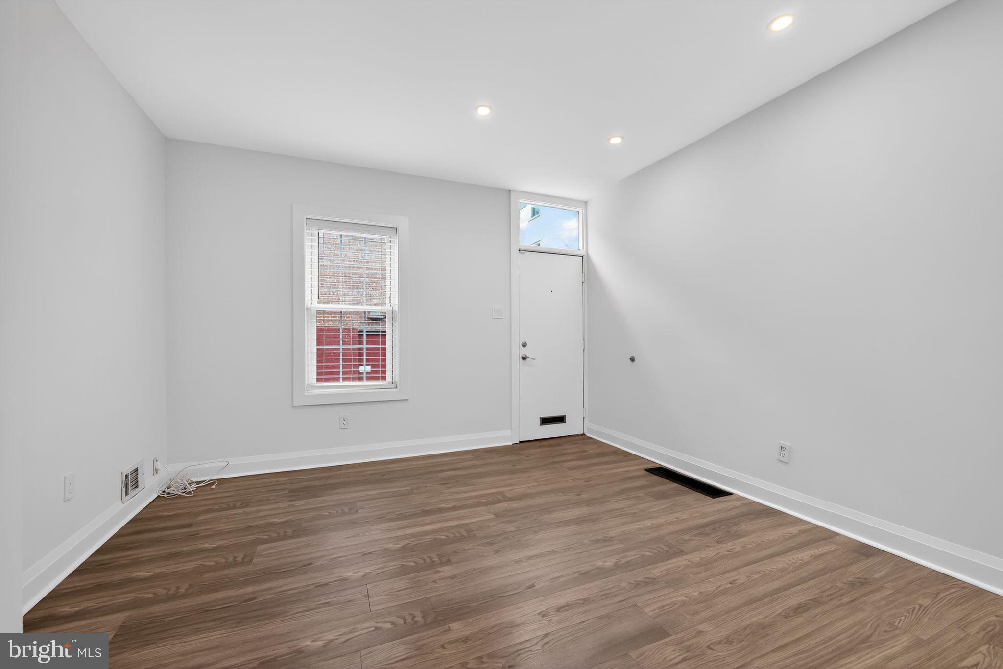 608 Kater Street Philadelphia, PA 19147 - Photo 5 of 30 a view of empty room with wooden floor and fan