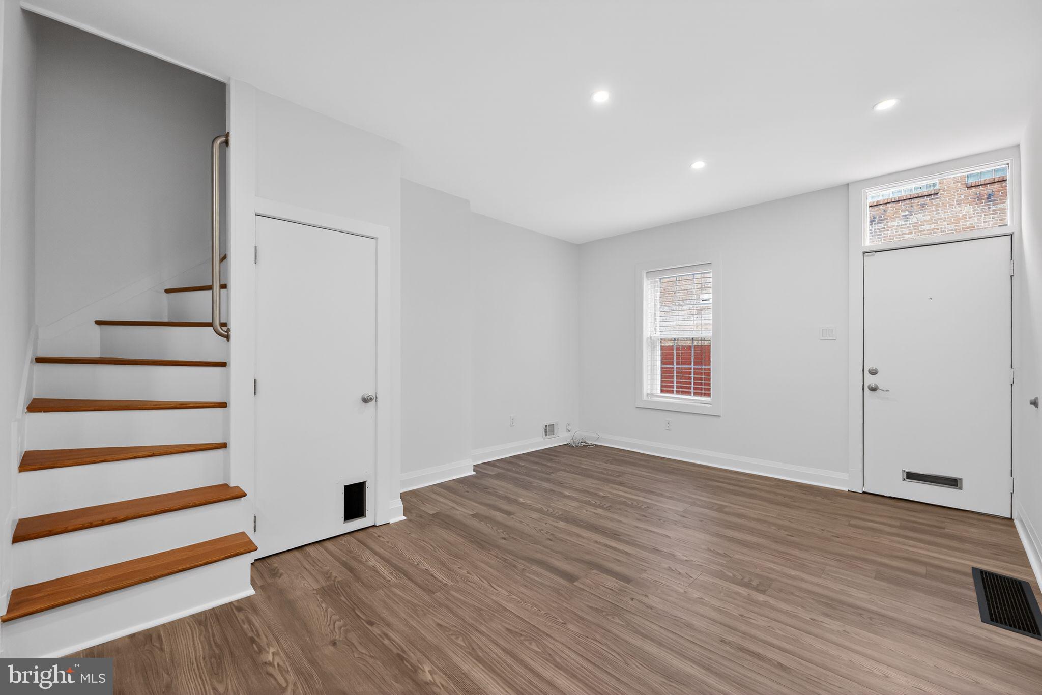 608 Kater Street Philadelphia, PA 19147 - Photo 6 of 30 wooden floor in an empty room with a window
