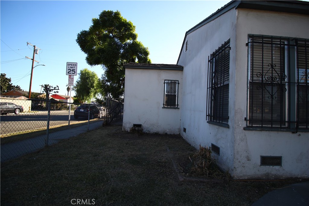 4522 East Rosecrans Avenue Compton, CA 90221 - Photo 17 of 75 a backyard of a house with lots of green space and fountain