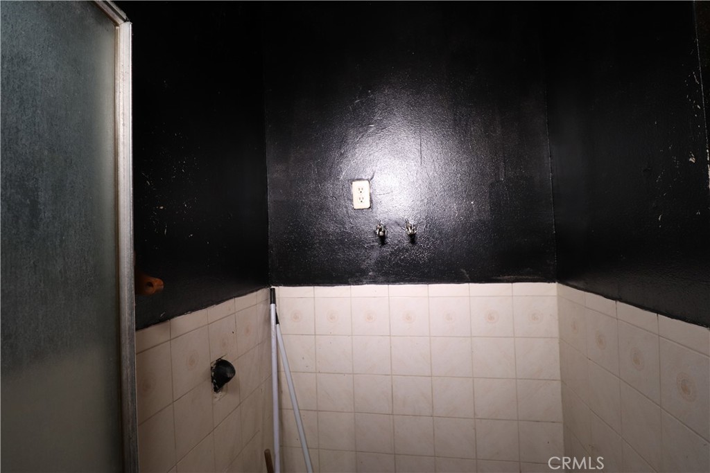 4522 East Rosecrans Avenue Compton, CA 90221 - Photo 26 of 75 a bathroom with a shower