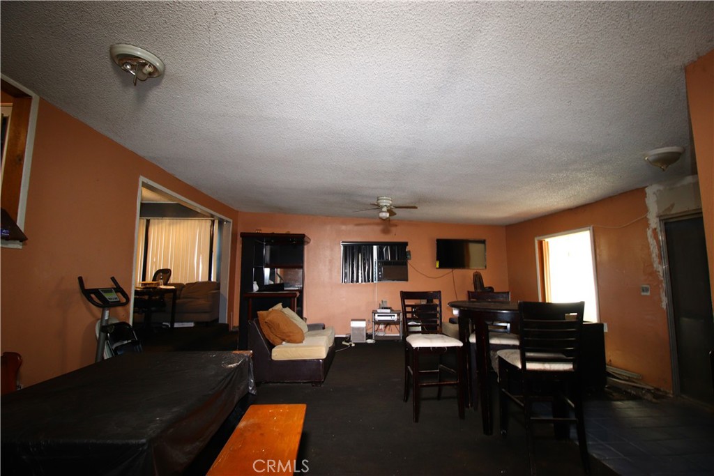 4522 East Rosecrans Avenue Compton, CA 90221 - Photo 28 of 75 a living room with furniture dining table and a window