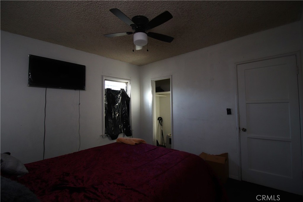 4522 East Rosecrans Avenue Compton, CA 90221 - Photo 47 of 75 a bed room with a bed and a television
