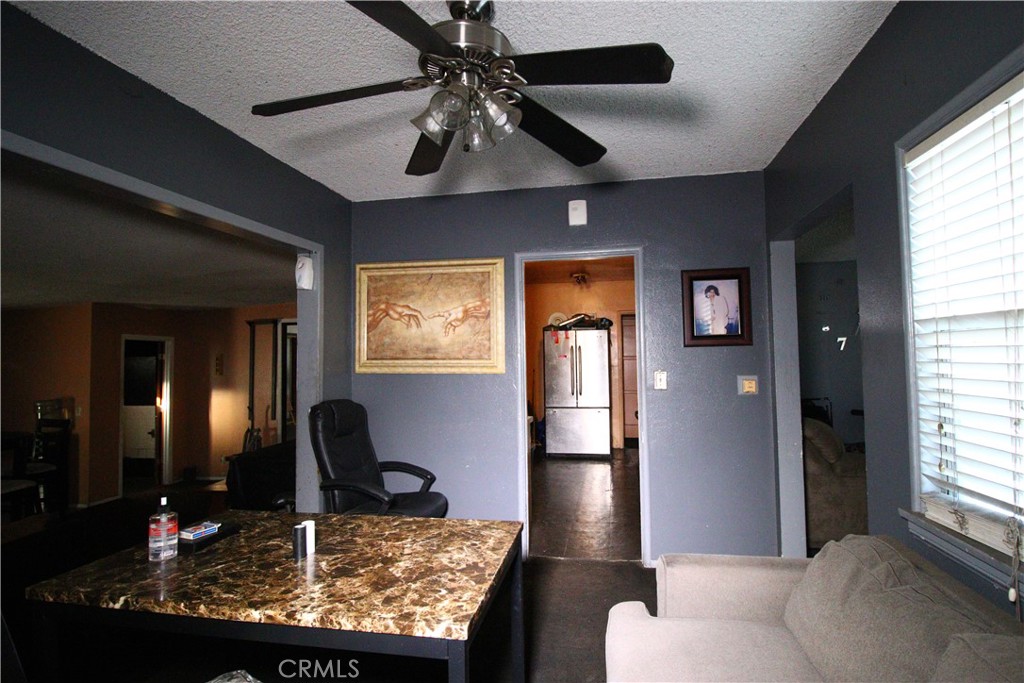 4522 East Rosecrans Avenue Compton, CA 90221 - Photo 64 of 75 a living room with furniture and a large window