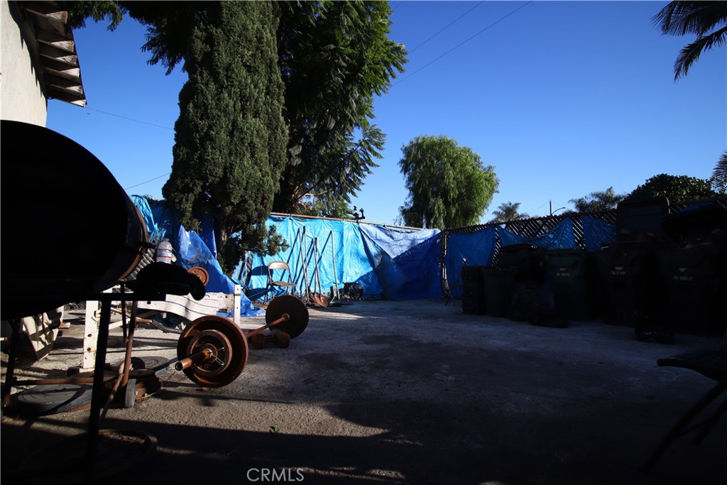 4522 East Rosecrans Avenue Compton, CA 90221 - Photo 72 of 75 a view of a car is parked in front of a house