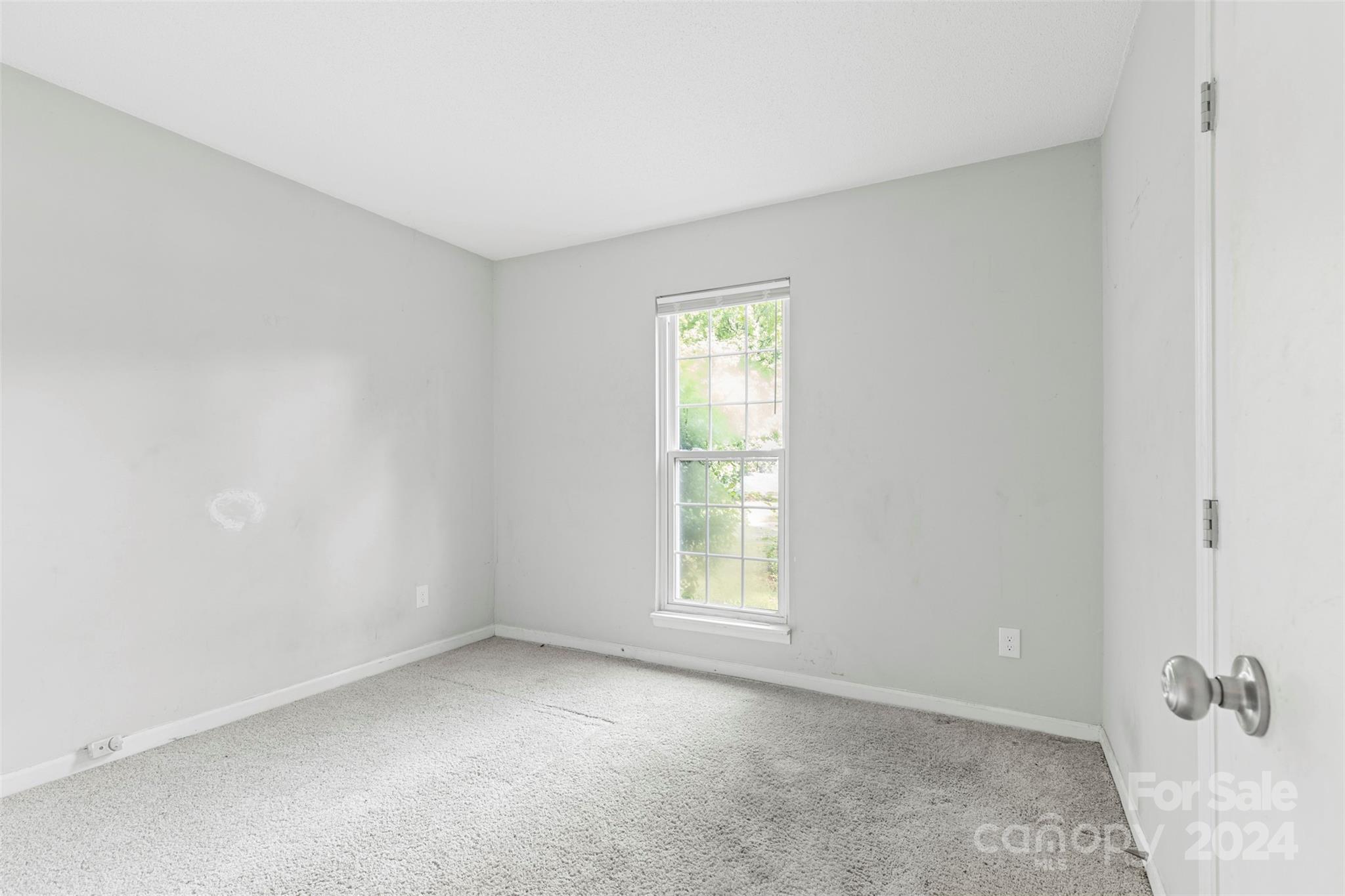 6803 North Ridge Court Charlotte, NC 28215 - Photo 14 of 30 an empty room with a window