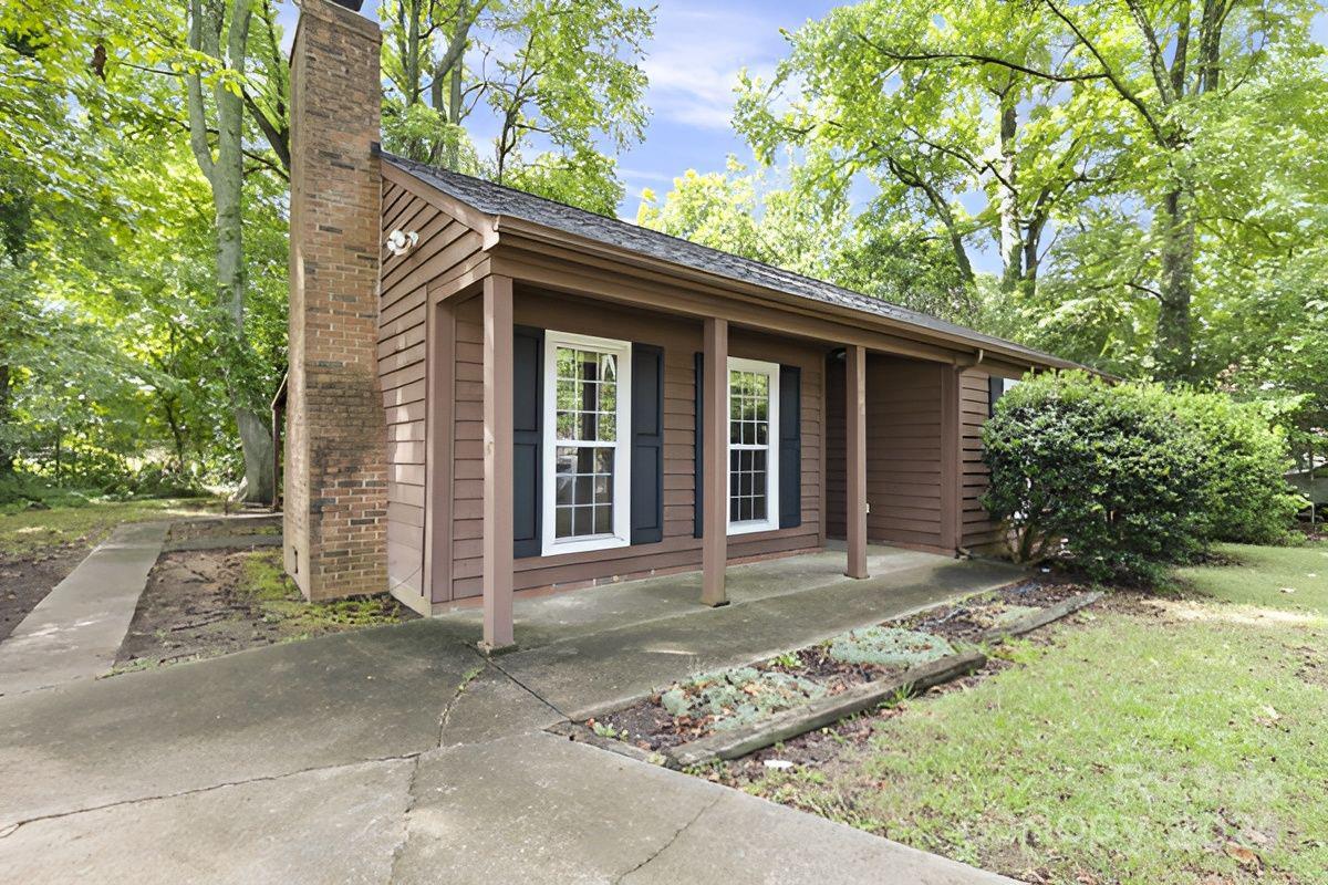 6803 North Ridge Court Charlotte, NC 28215 - Photo 30 of 30 a front view of a house with garden