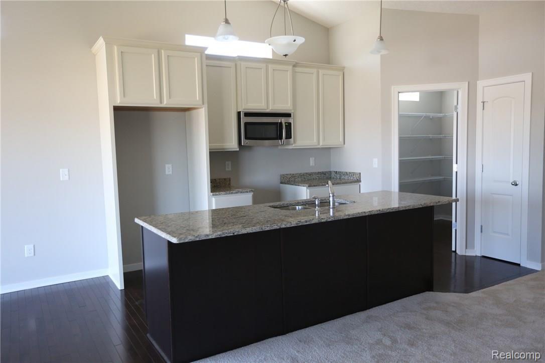 489 Hosta, Unit 87 Howell, MI 48843 - Photo 5 of 16 Please note, pictures are of different condominium with identical floor plan!