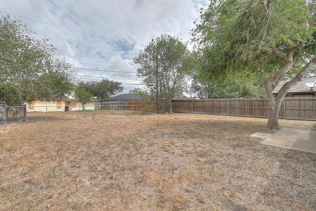 5225 Bonham Street Corpus Christi, TX 78415 - Photo 37 of 40 a view of backyard and tree