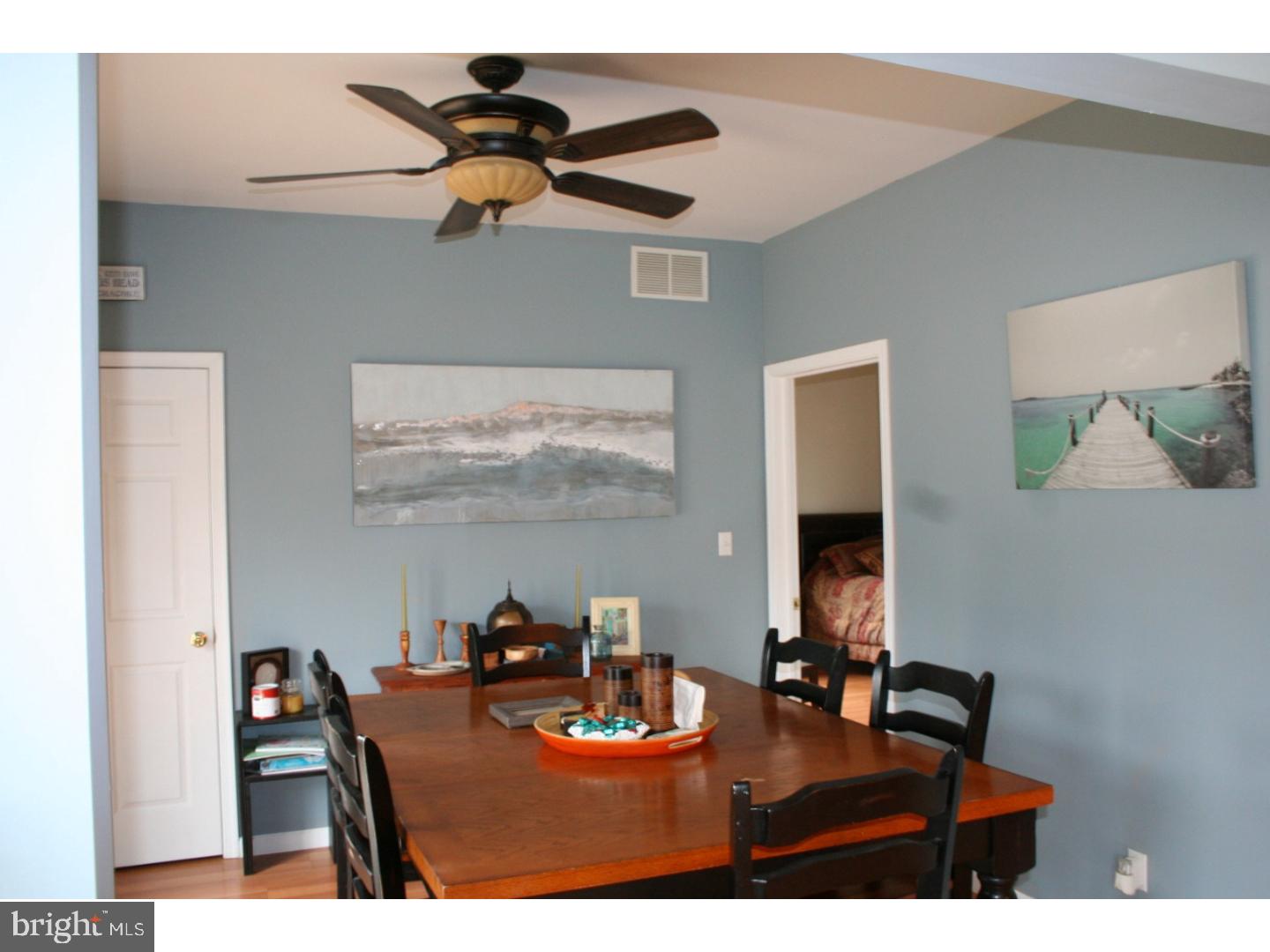 468 Alvine Road Elmer, NJ 08318 - Photo 18 of 25 a dining room with furniture and wooden floor