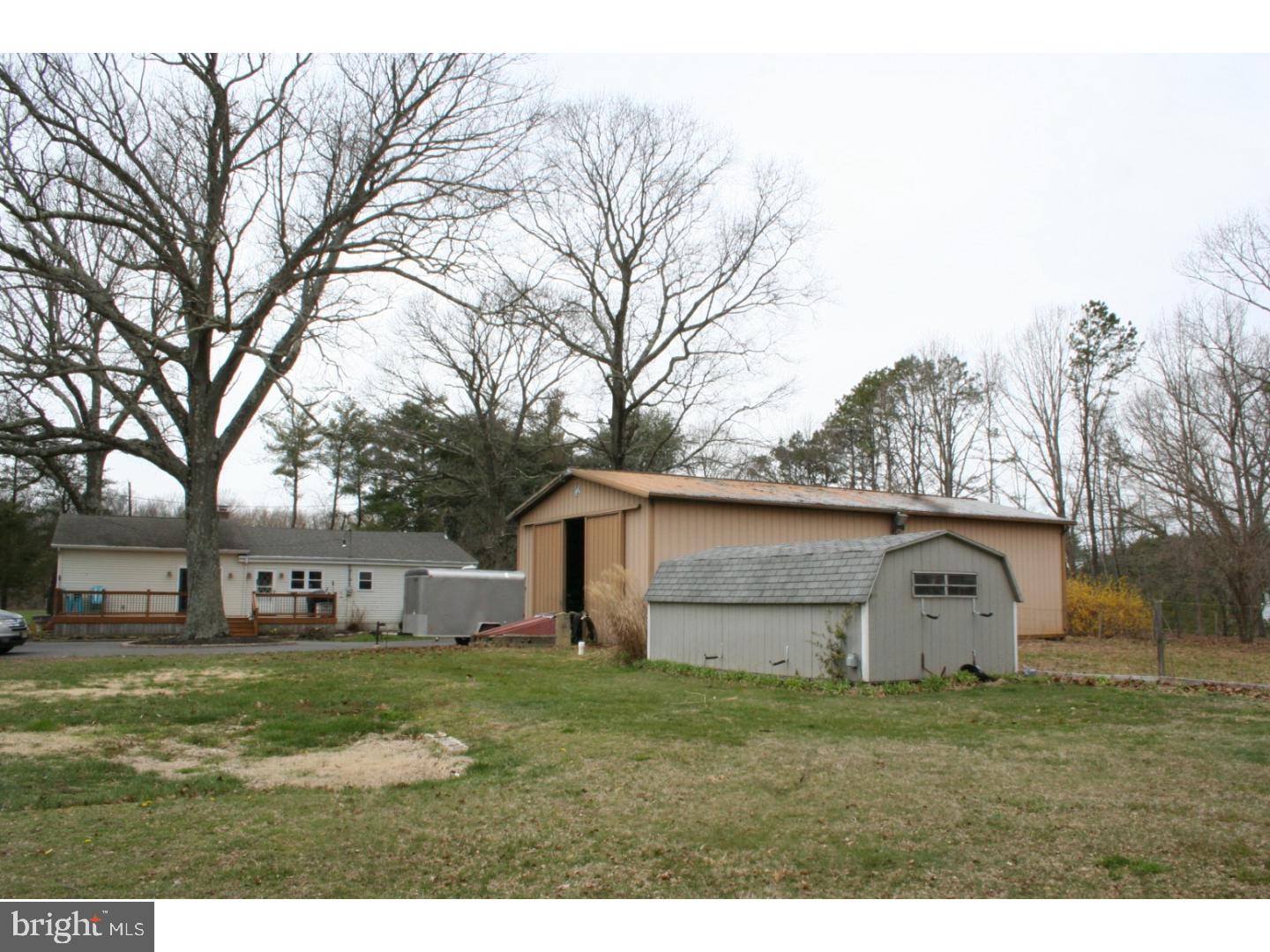 468 Alvine Road Elmer, NJ 08318 - Photo 3 of 25 a front view of house with yard and trees