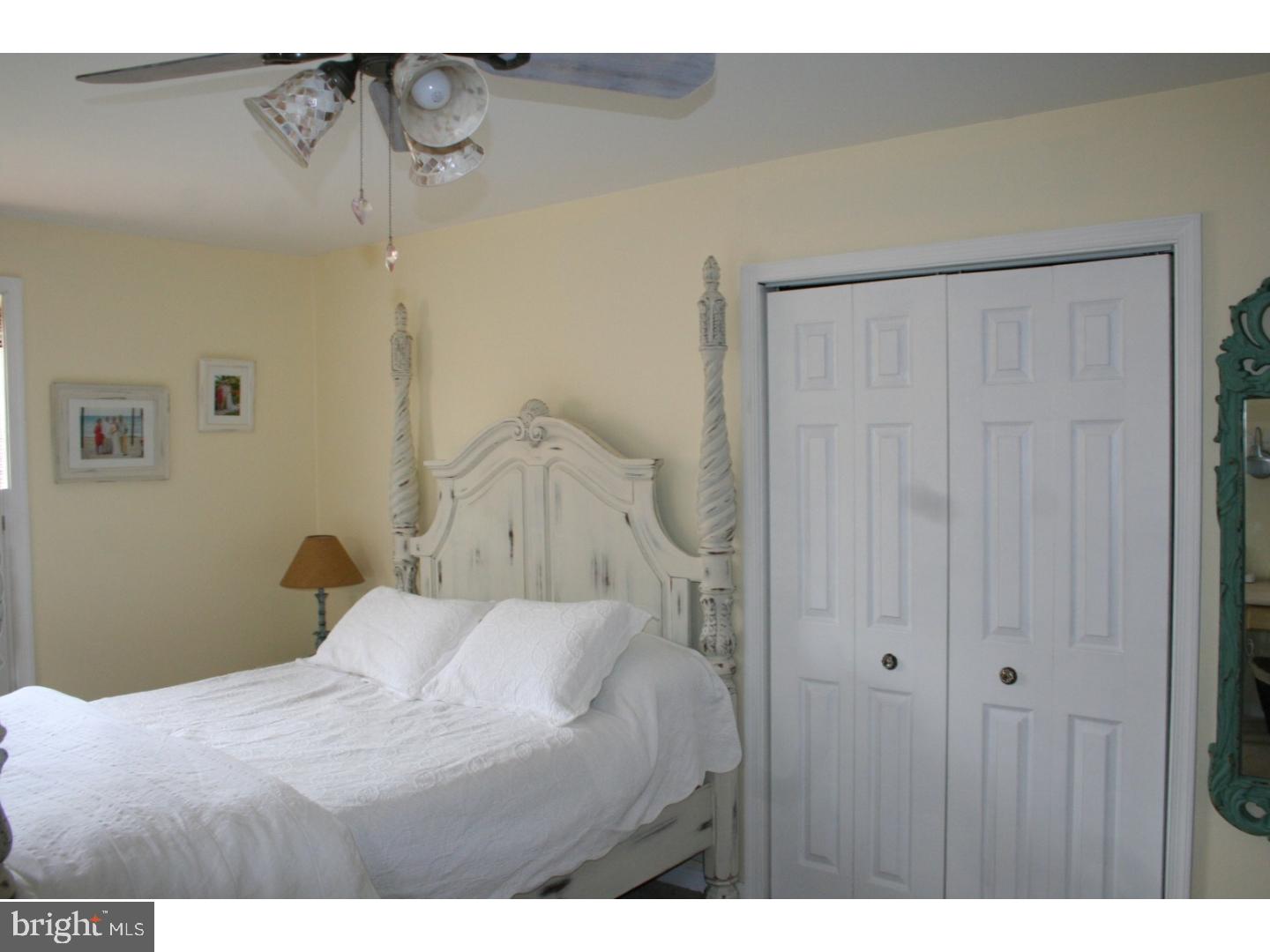468 Alvine Road Elmer, NJ 08318 - Photo 21 of 25 a bedroom with a bed and a cabinets