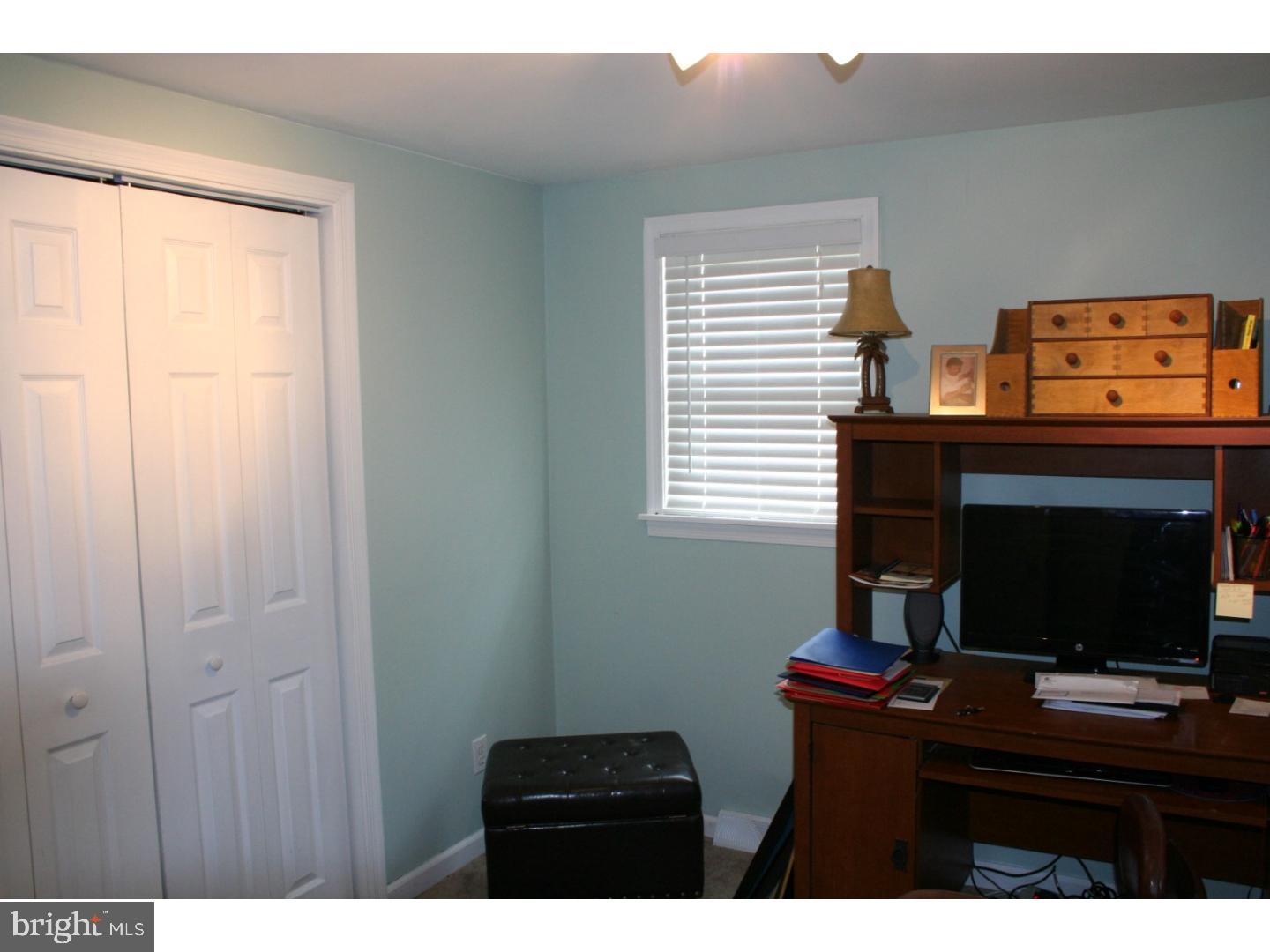 468 Alvine Road Elmer, NJ 08318 - Photo 23 of 25 a room with a flat screen tv and a window