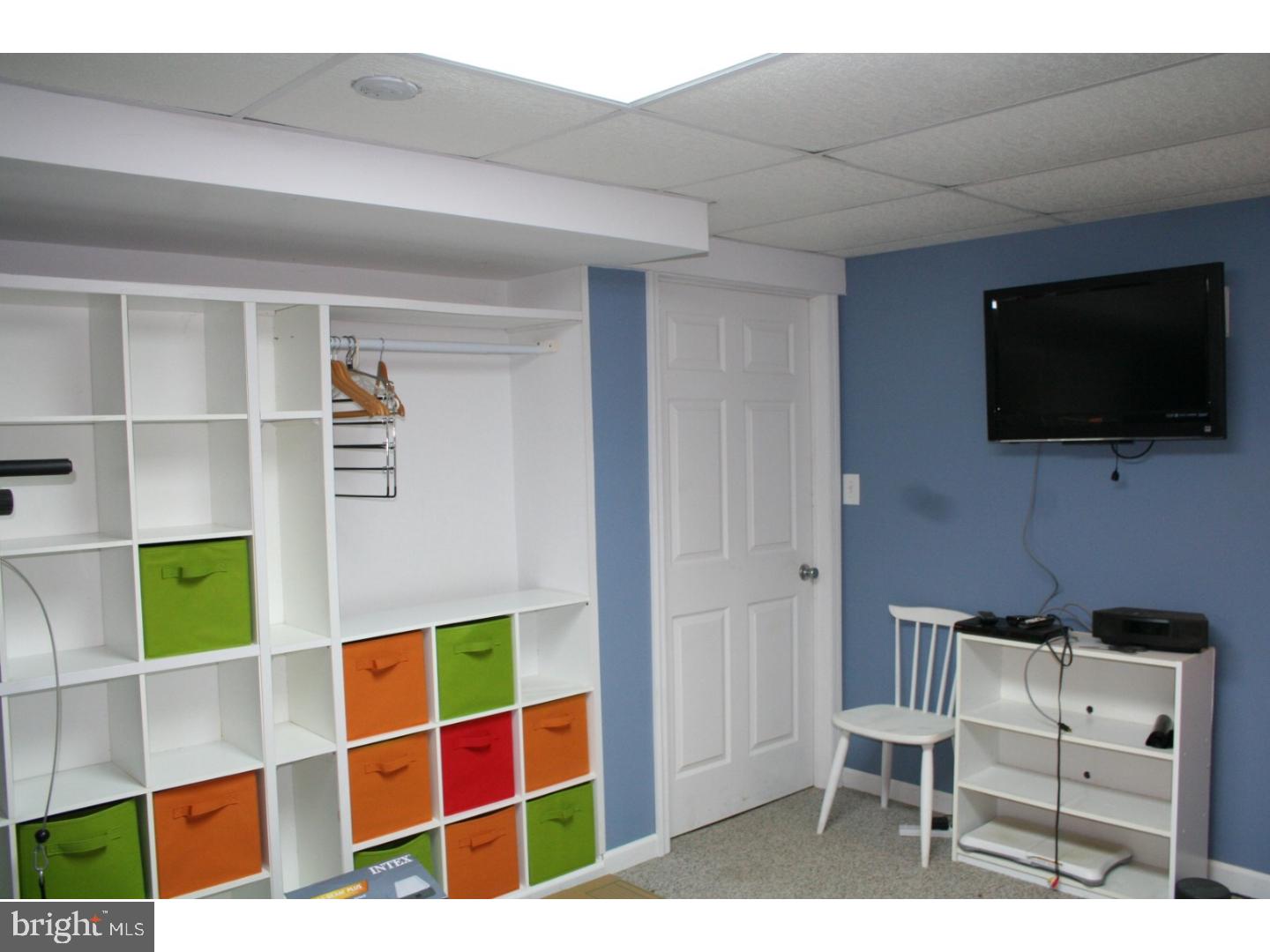 468 Alvine Road Elmer, NJ 08318 - Photo 24 of 25 a living room with furniture and a flat screen tv