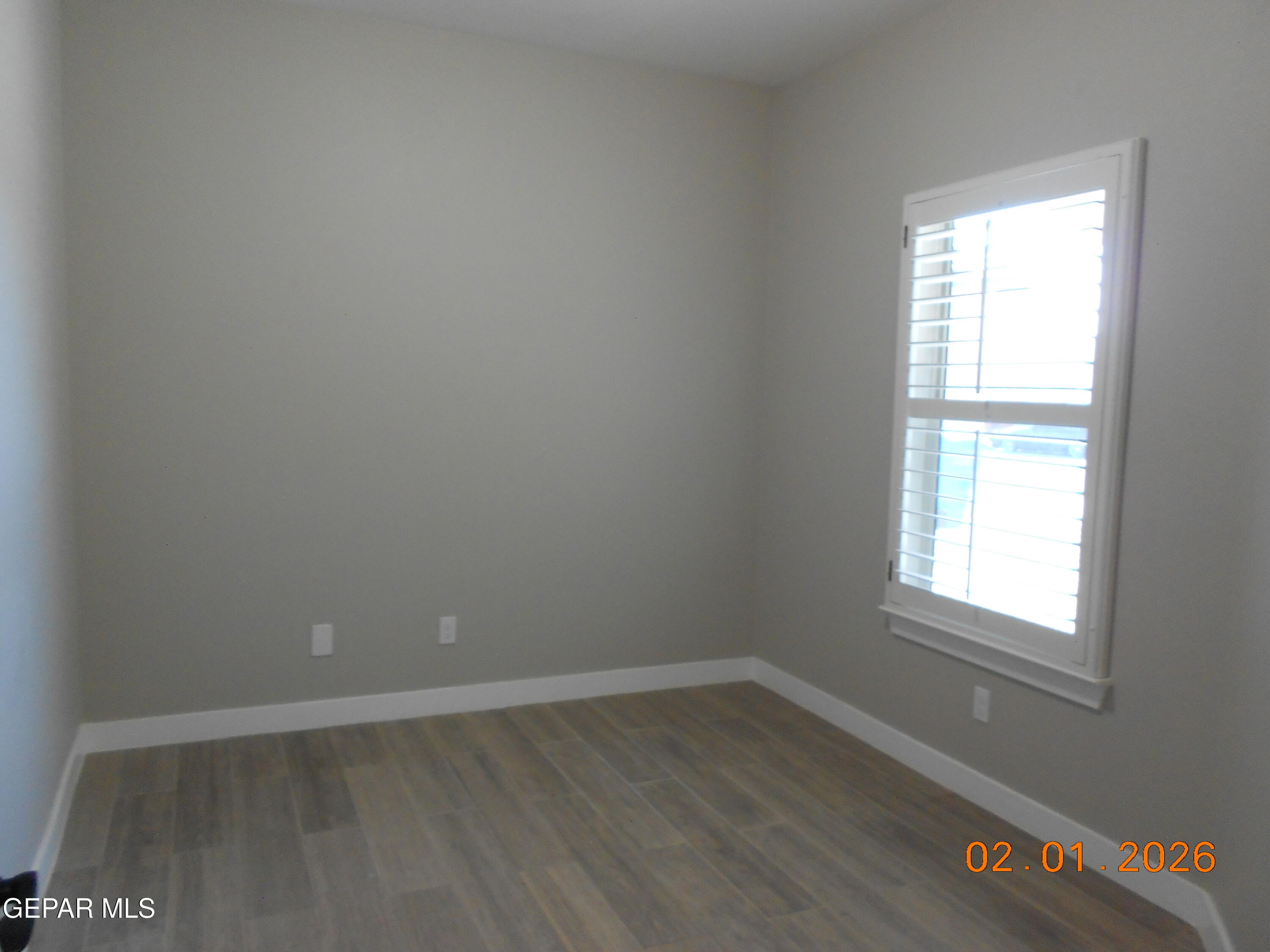 10013 Hueco Jct Road Socorro, TX 79927 - Photo 11 of 27 an empty room with a window