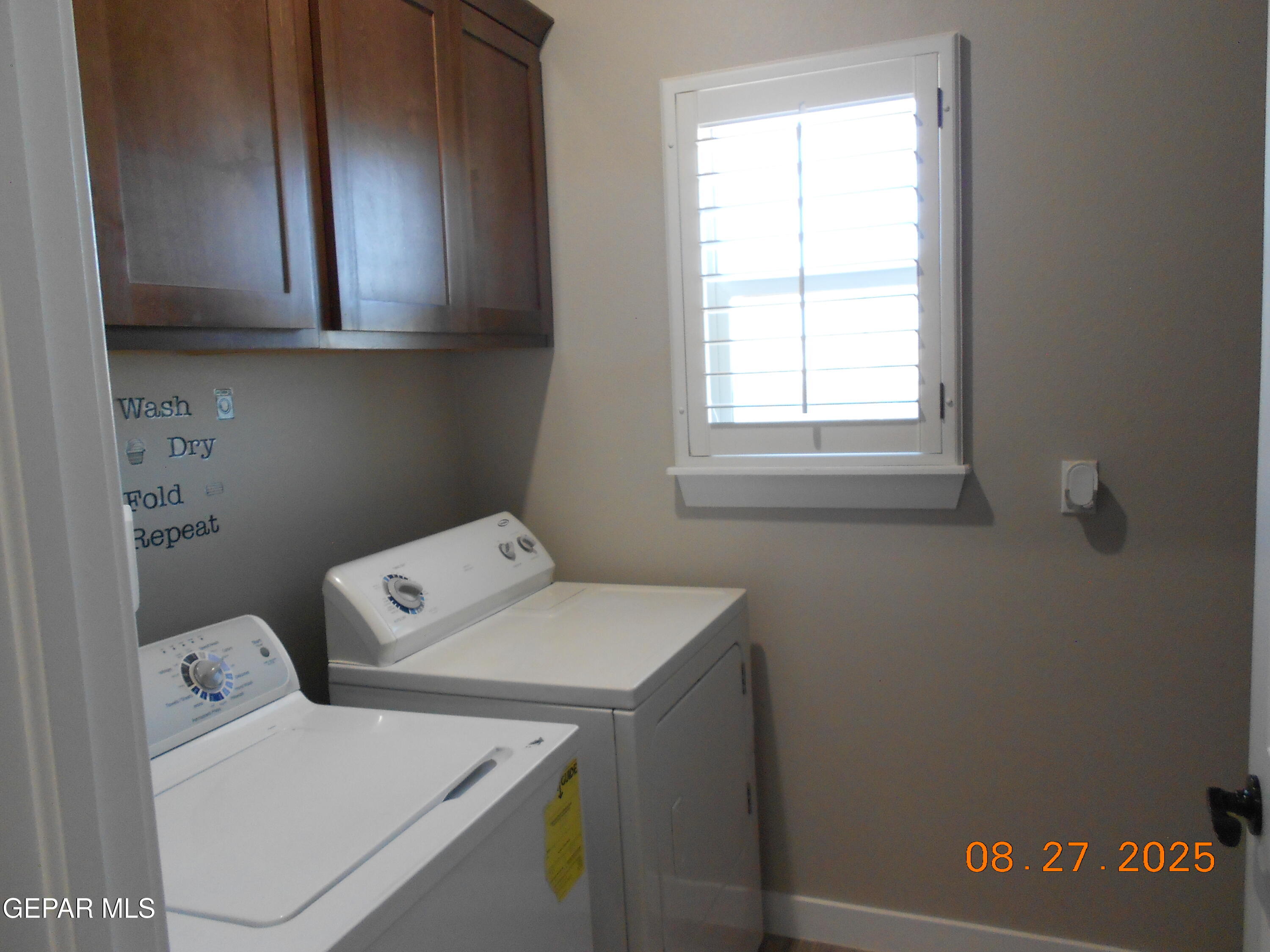 10013 Hueco Jct Road Socorro, TX 79927 - Photo 21 of 27 a utility room with dryer and washer