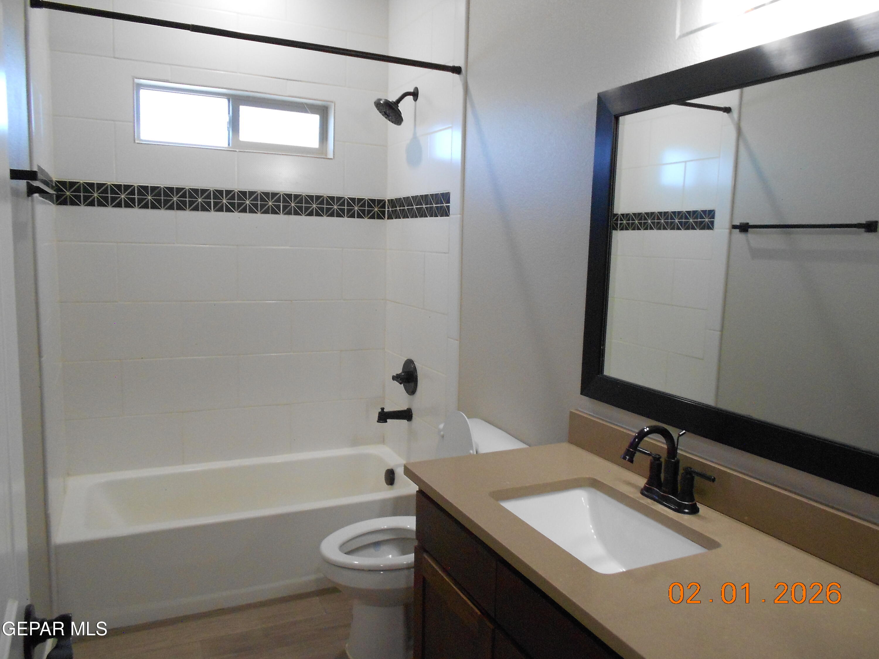 10013 Hueco Jct Road Socorro, TX 79927 - Photo 22 of 27 a bathroom with a sink double vanity and a mirror