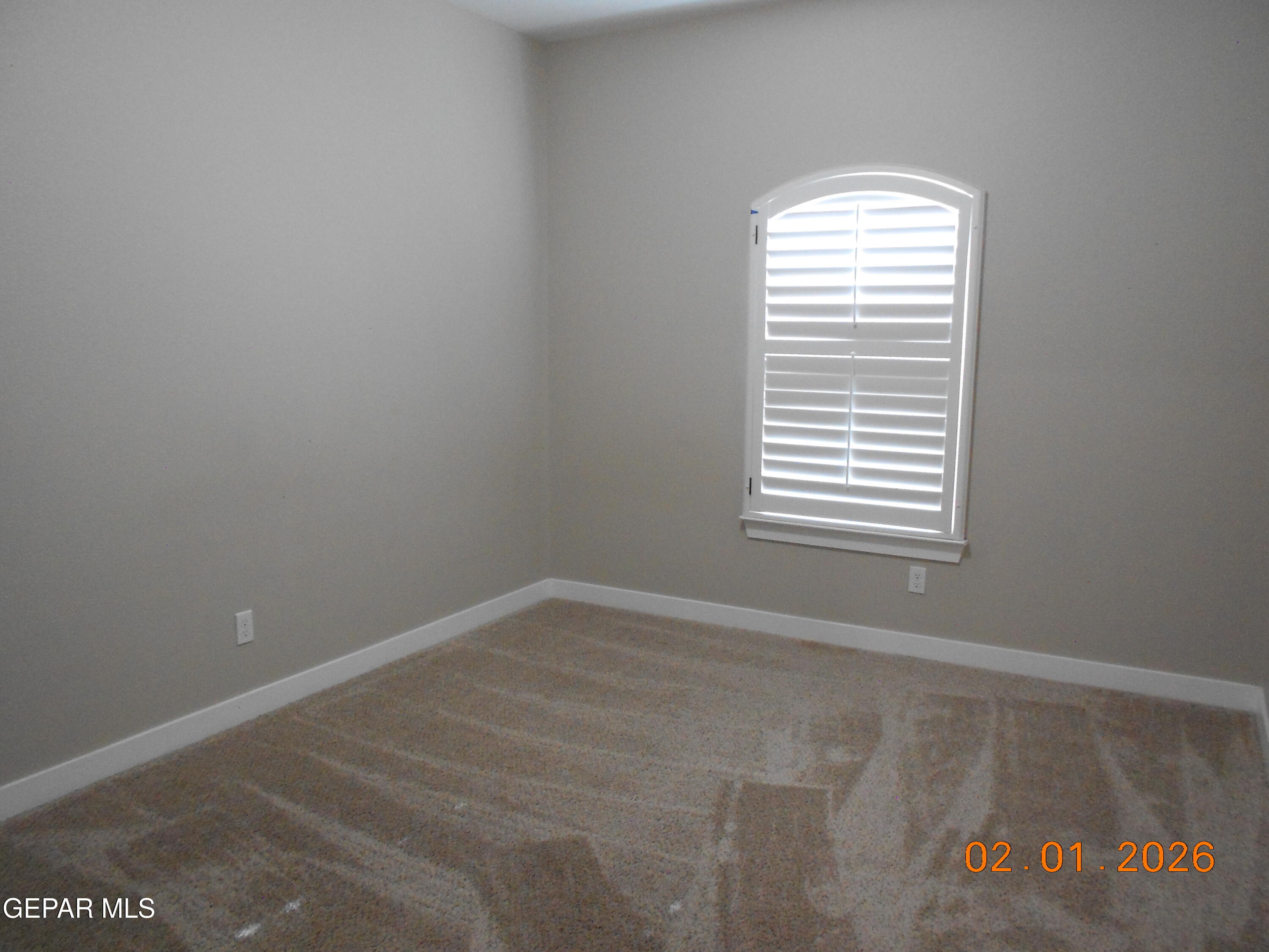 10013 Hueco Jct Road Socorro, TX 79927 - Photo 24 of 27 a view of an empty room with a window
