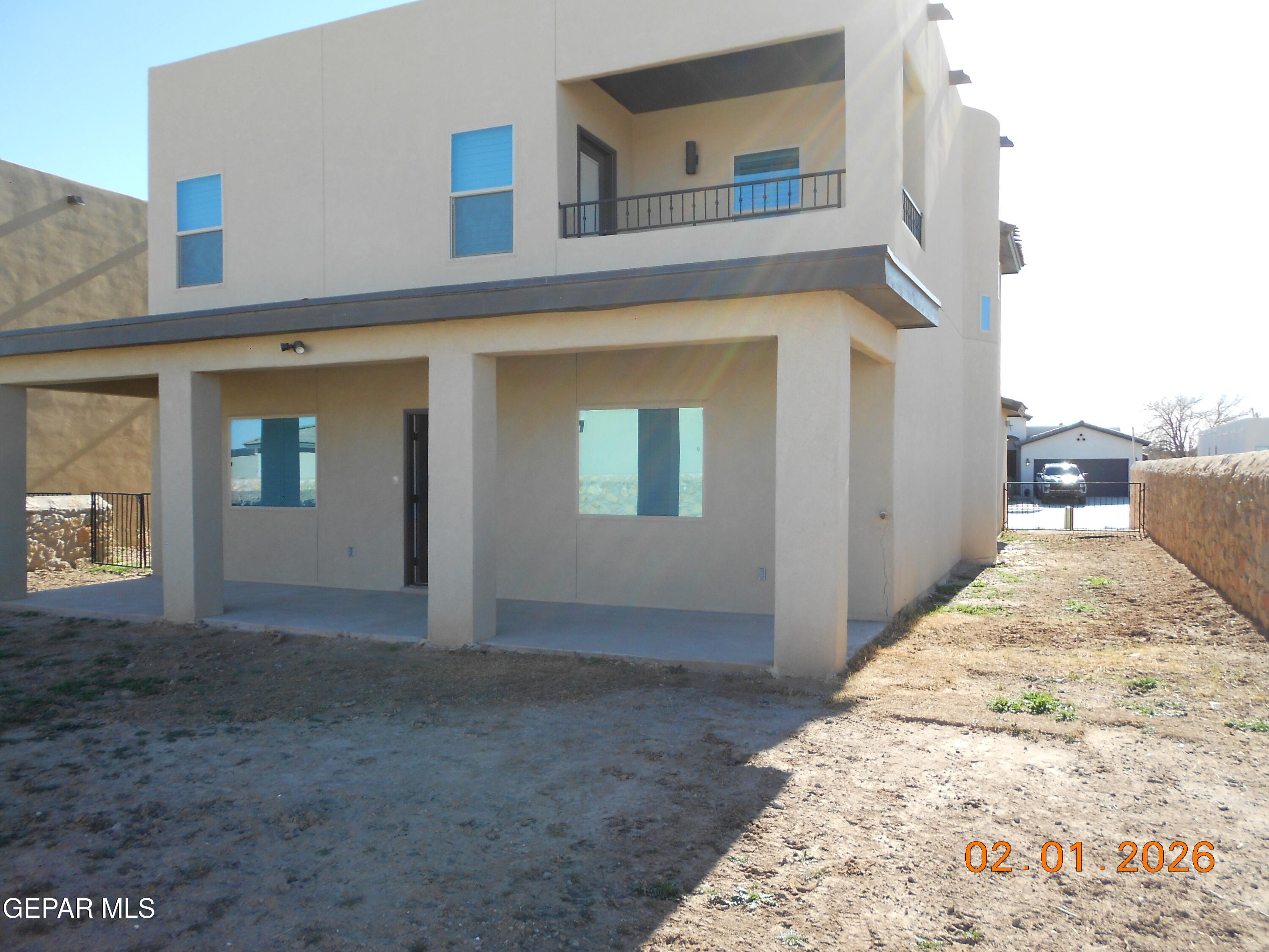 10013 Hueco Jct Road Socorro, TX 79927 - Photo 27 of 27 a view of backyard with large windows