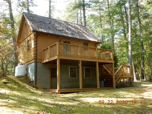 a view of a house with a swimming pool