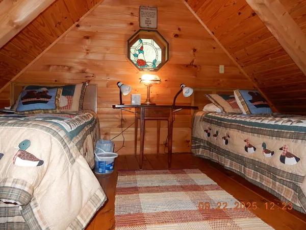 a view of a hallway with washer and dryer