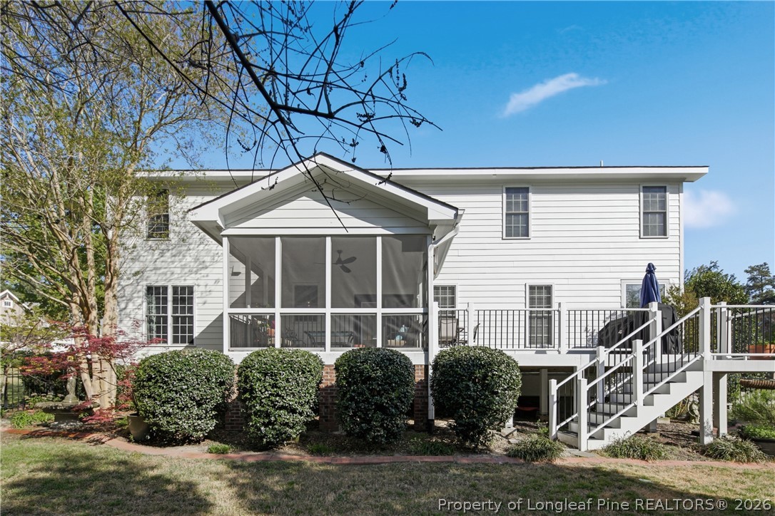 14 Spring Water Court Spring Lake, NC 28390 - Photo 25 of 34 a front view of a house with garden