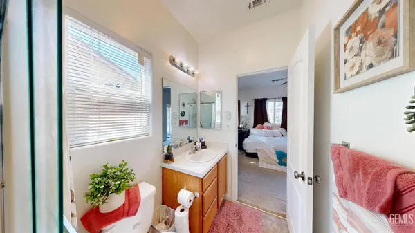 a view of living room with furniture and flower pot