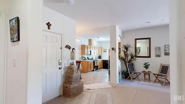 a bathroom with a sink toilet and mirror