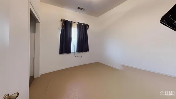 an empty room with closet