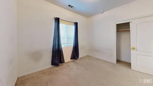 a view of a room with windows