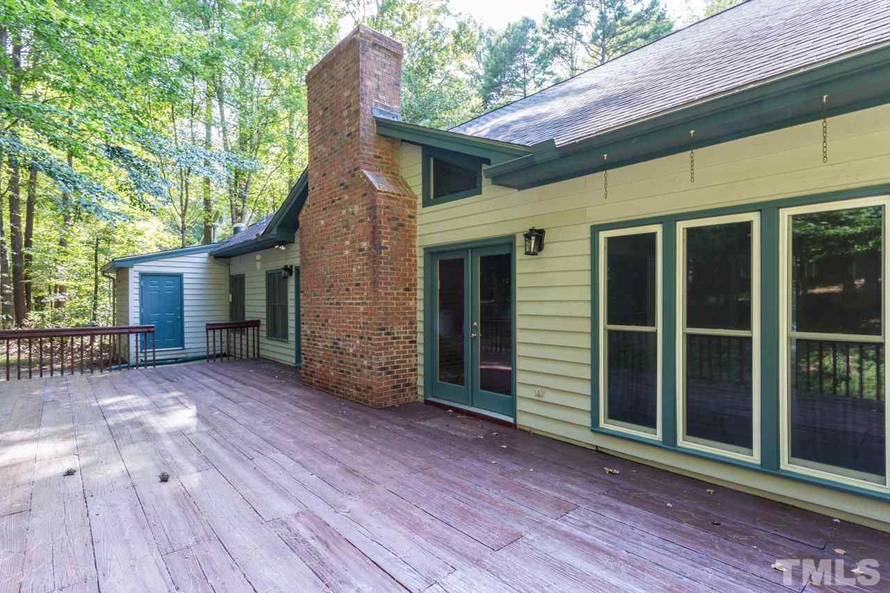 2909 Patrie Place Raleigh, NC 27613 - Photo 24 of 25 a view of a house with a yard and wooden floor