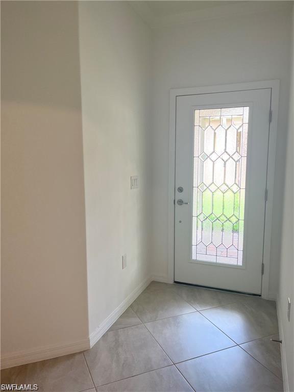 2057 Tamarron Lane Naples, FL 34120 - Photo 16 of 27 a view of an empty room and a window