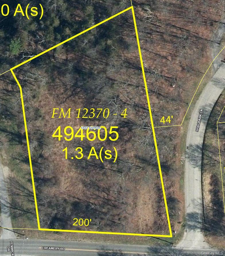 a sign that is on a brick wall