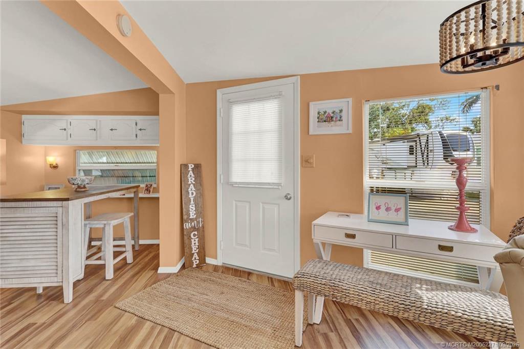 10701 South Ocean Drive, Unit 713 Jensen Beach, FL 34957 - Photo 5 of 39 a very nice looking room with a large window