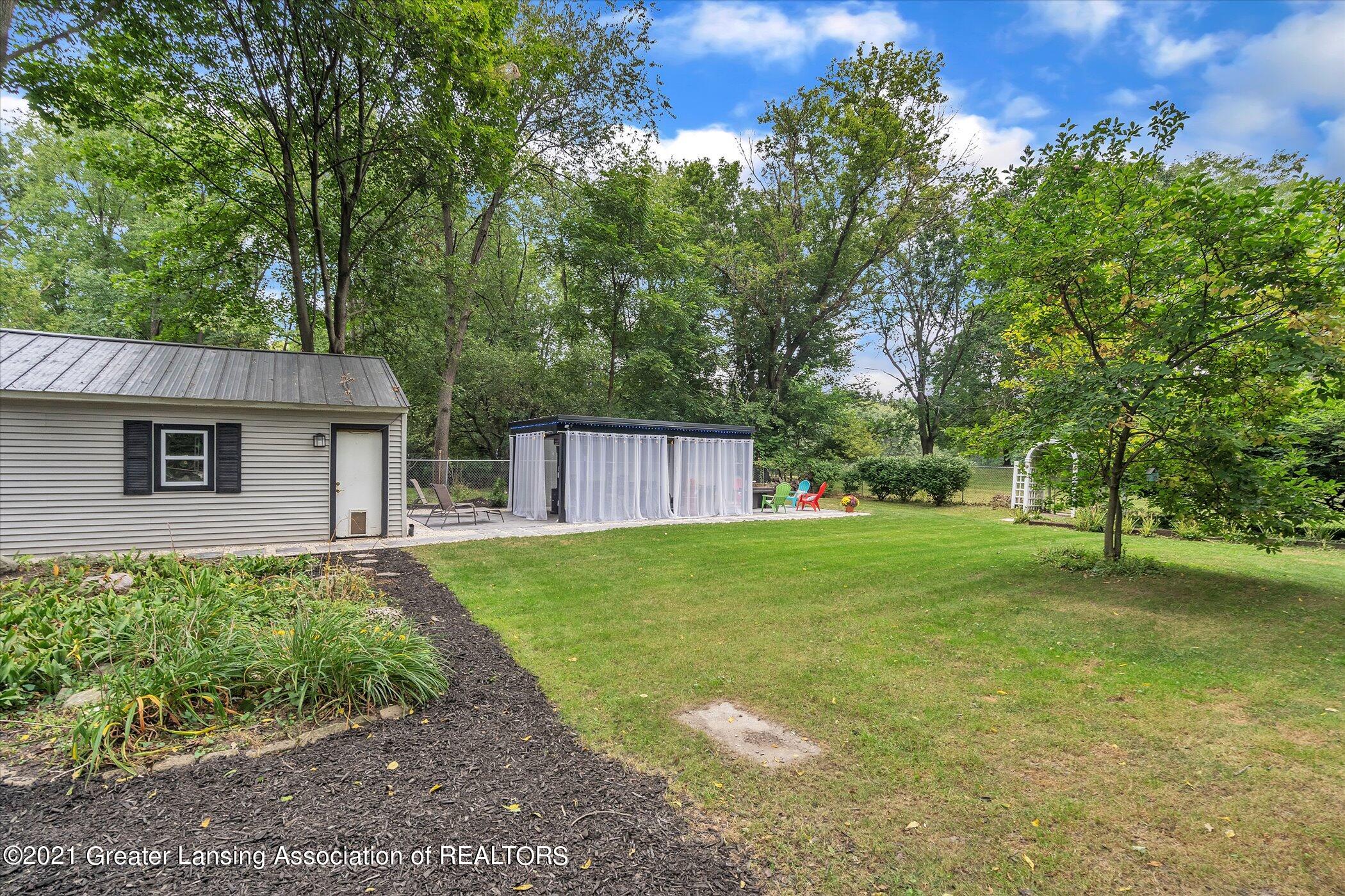 2821 North Aurelius Road Lansing, MI 48910 - Photo 42 of 48 42-2821 Aurelius Rd-Windowstill-Real-Est