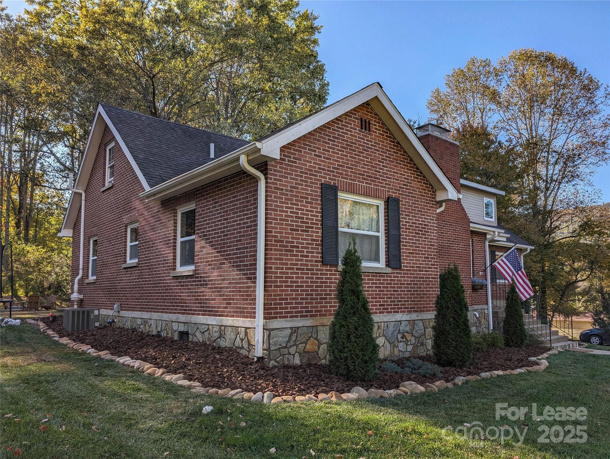 317 Balsam Drive Waynesville, NC 28786 - Photo 2 of 45 a view of front of a house with a yard