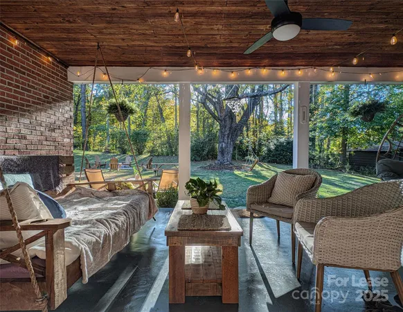 a outdoor space with patio the couches and a dining table with garden view