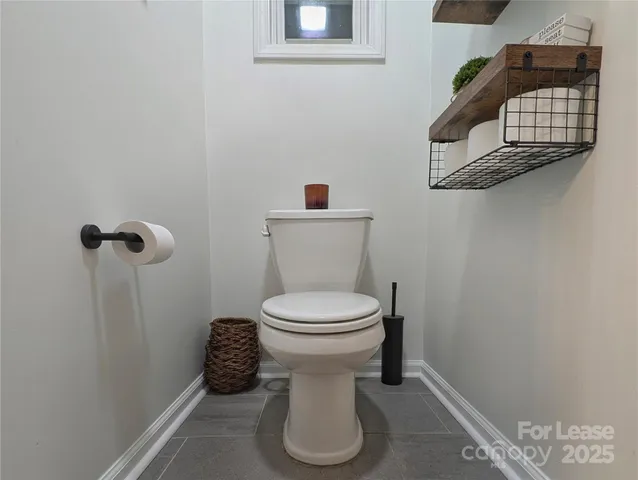 a bathroom with a toilet and a sink