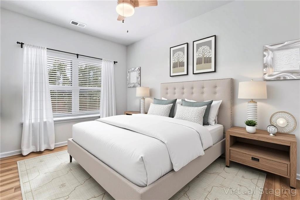 23 Carrington Way Newnan, GA 30265 - Photo 21 of 37 a bedroom with bed and a large window